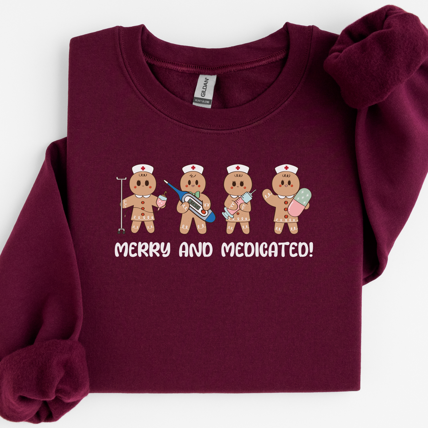 Merry And Medicated Christmas Nurse Sweatshirt, Nurse Christmas Gingerbread Sweater, ER Nurse Crewneck Sweater, RN Nurse Gift, Funny Nurse Tshirt